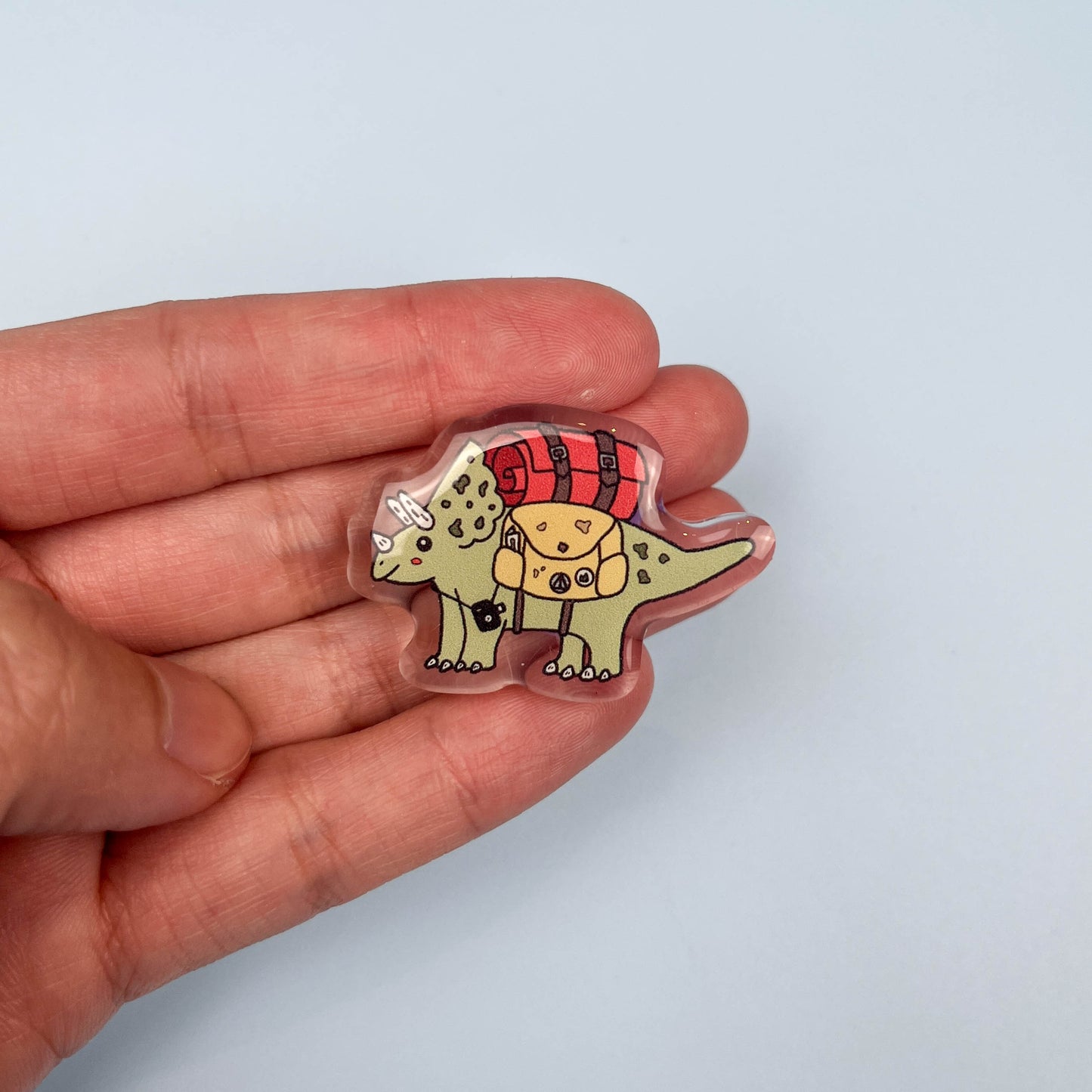 Travelling Triceratops Acrylic Pin